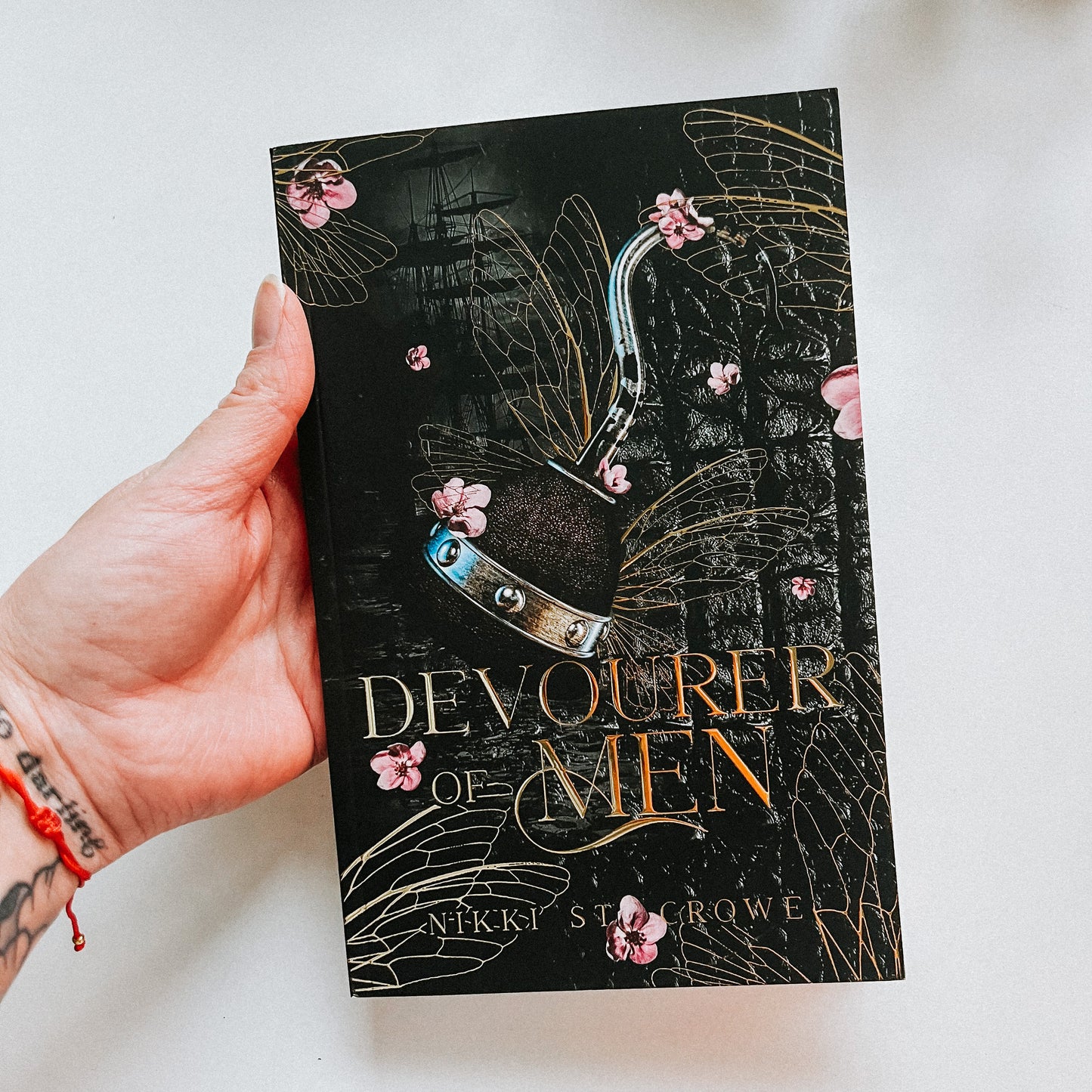 Devourer of Men Gold Foil Special Edition Paperback | Wings Edition